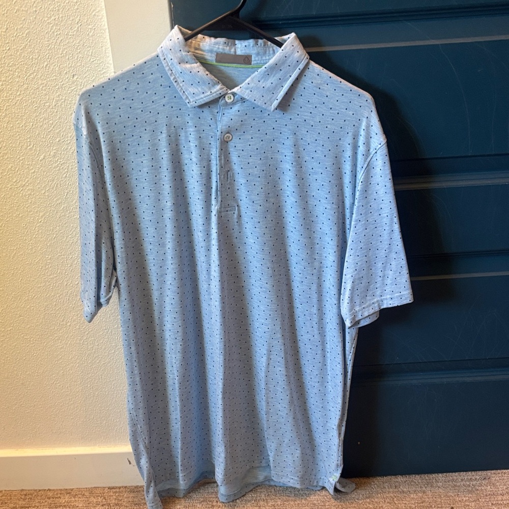 Sky Blue Polo Shirt with Subtle Pattern